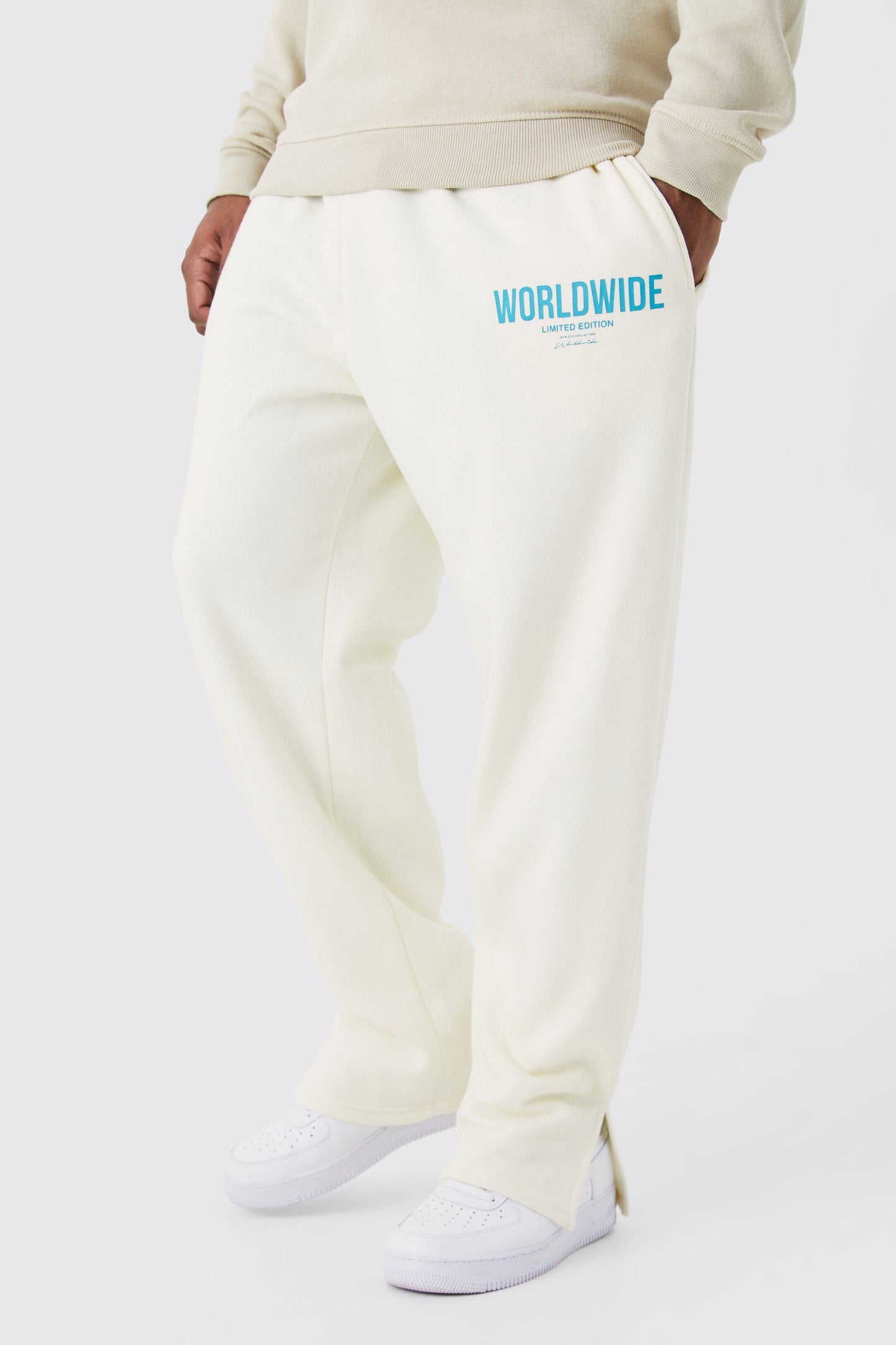 SPLIT HEM WORLDWIDE TEXT PRINT JOGGER